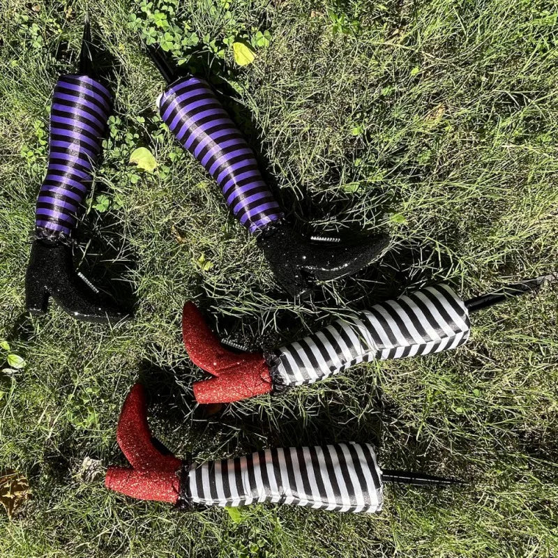Halloween garden decoration: witch legs with striped stockings and boots for lawn, garden, and party decor | Sansoti