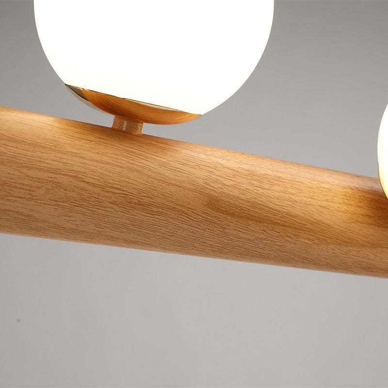 Hängeleuchte Glaskugel mit Deckenbefestigung aus Holz in warmem Walnusston - elegante Ambientebeleuchtung für das Wohnzimmer | Sansoti