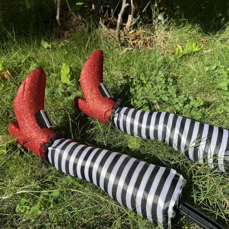 Halloween garden decoration: witch legs with striped stockings and boots for lawn, garden, and party decor | Sansoti