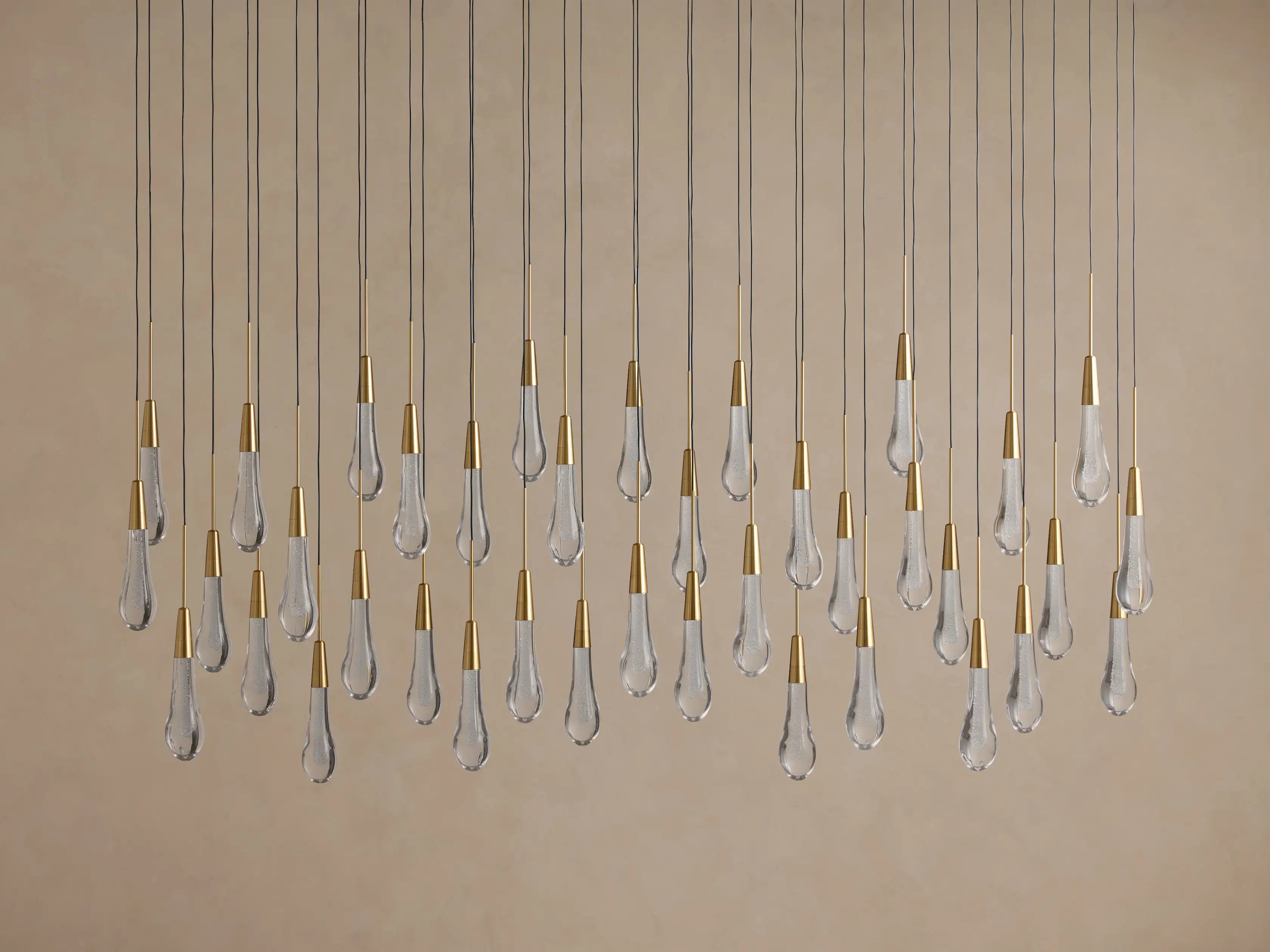 Lustre linéaire avec lampes LED réglables adapté à la salle à manger et à la cuisine en verre fabriqué à la main au design moderne | Sansoti