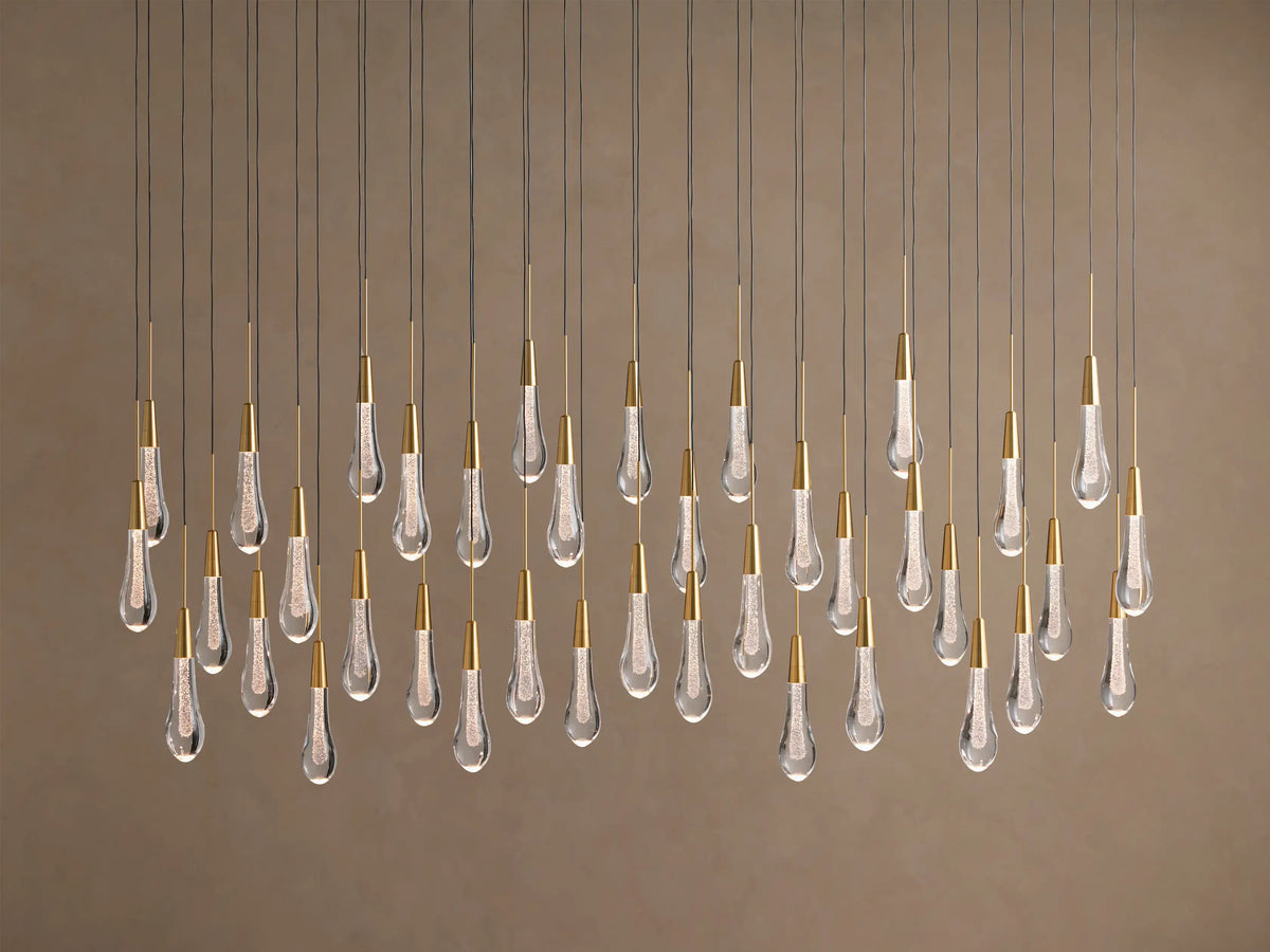 Lustre linéaire avec lampes LED réglables adapté à la salle à manger et à la cuisine en verre fabriqué à la main au design moderne | Sansoti