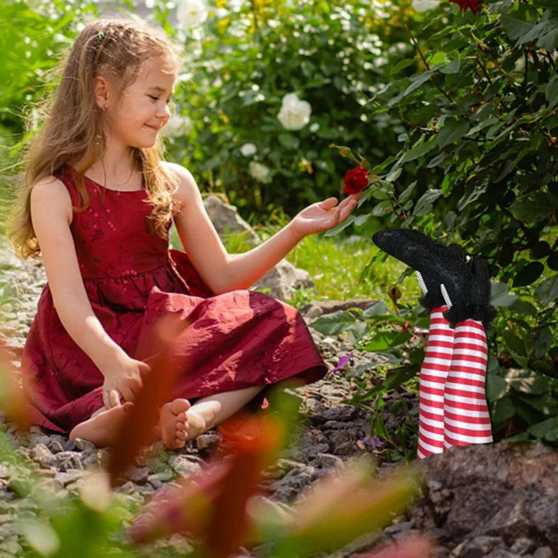 Halloween garden decoration: witch legs with striped stockings and boots for lawn, garden, and party decor | Sansoti
