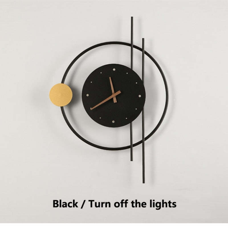 Horloge mural avec éclairage LED en métal et acrylique noir et doré, design moderne et décoratif pour salon et chambre | Sansoti