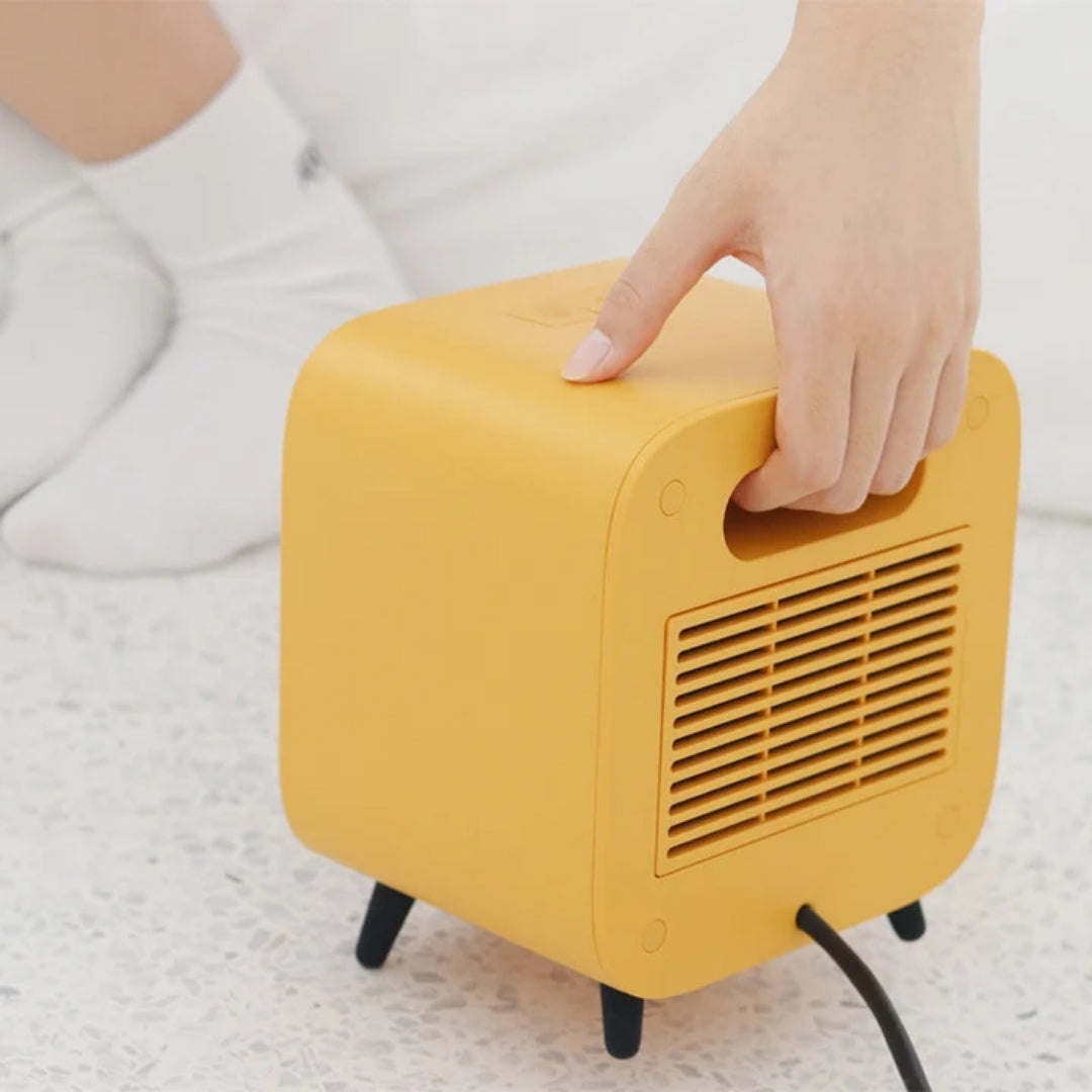 Compacte Elektrische Kachel 700W Draagbaar Verwarmingstoestel Oranje Wit Geel Voor Kantoor En Thuis Gebruik | Sansoti