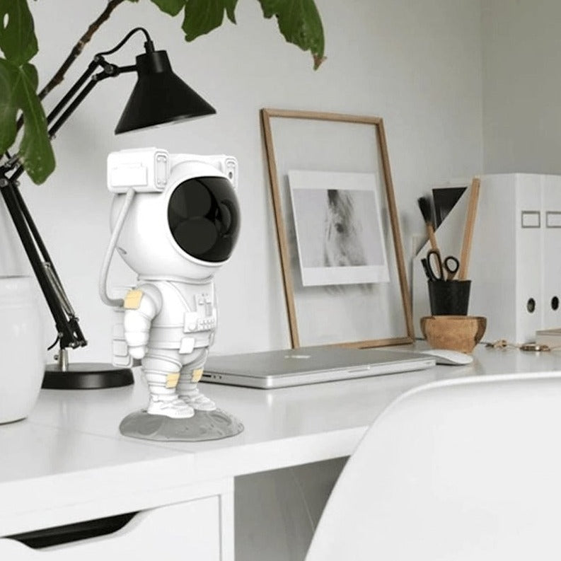 Astronaut star projector with snow effects, remote control, and timer for atmospheric bedroom lighting | Sansoti