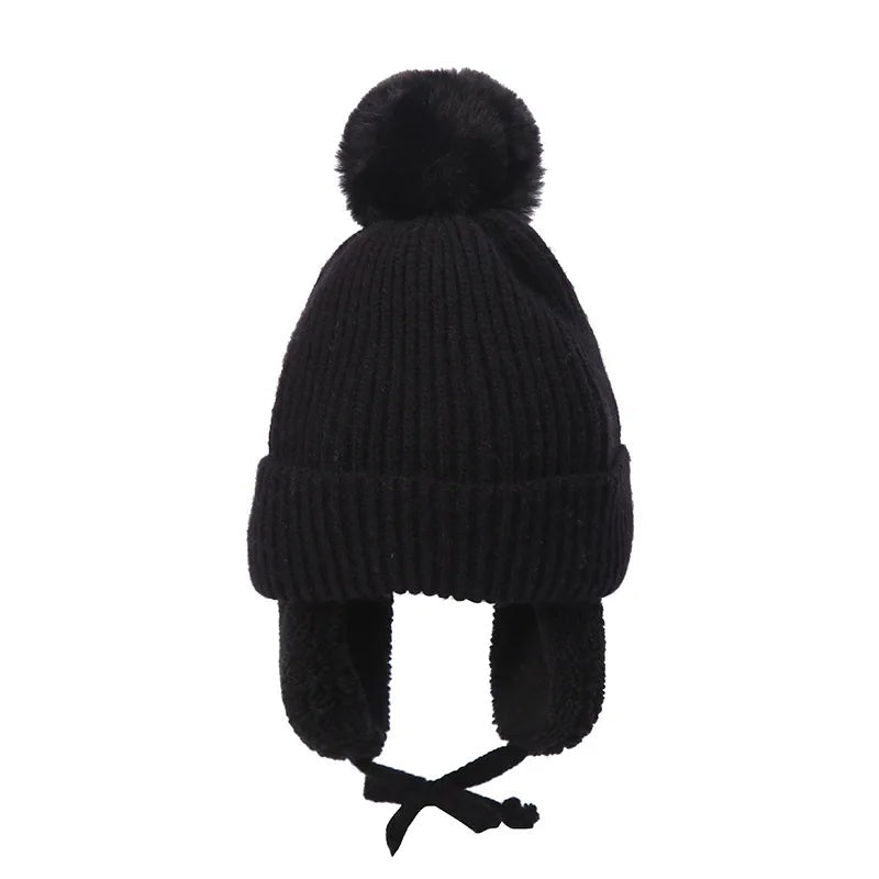 Bonnet tricoté pour enfants avec protège-oreilles et pompon, doublure douce en polaire, bonnet d'hiver chaud pour garçons et filles | Sansoti