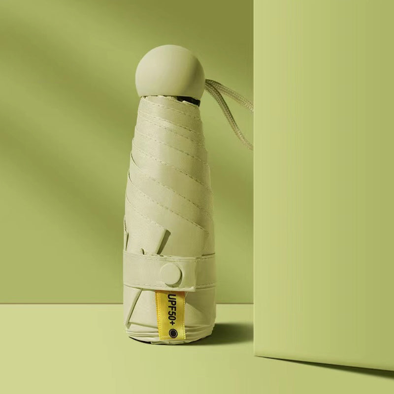 Kompakter faltbarer Regenschirm Capsule UPF50+ UV-Schutz im Taschenformat windbeständiger Mini-Reiseschirm | Sansoti