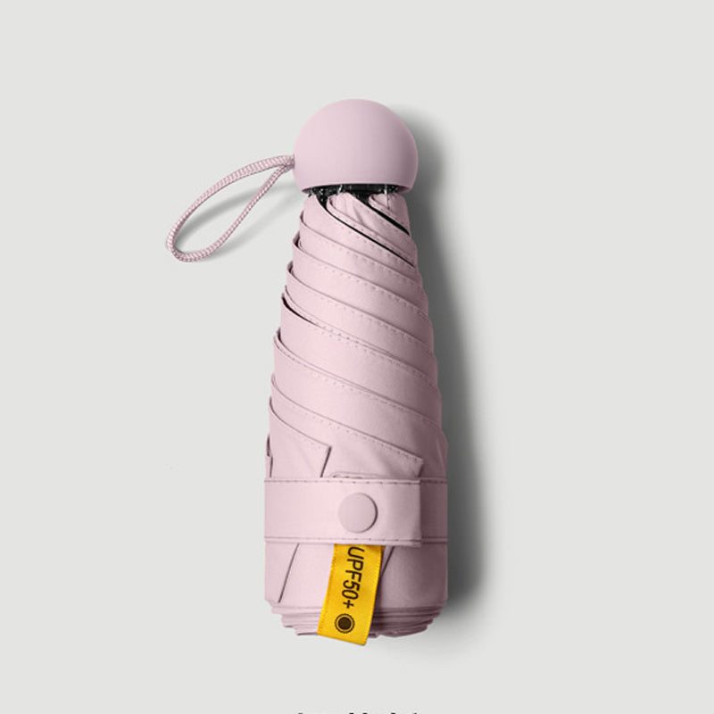 Kompakter faltbarer Regenschirm Capsule UPF50+ UV-Schutz im Taschenformat windbeständiger Mini-Reiseschirm | Sansoti