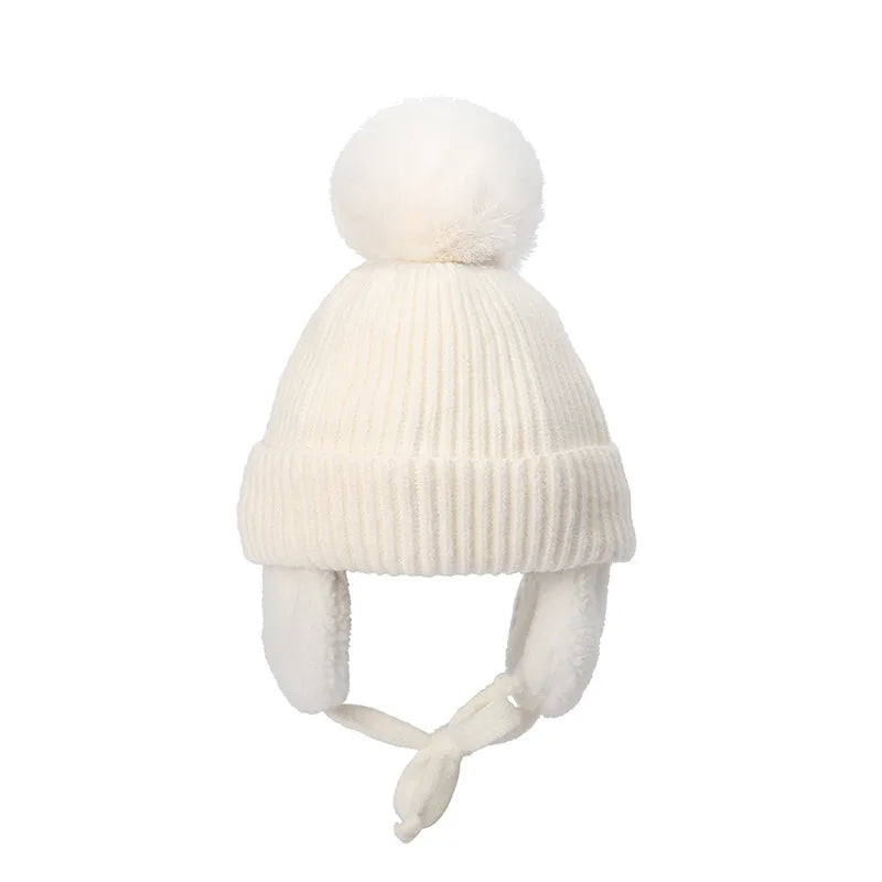 Bonnet tricoté pour enfants avec protège-oreilles et pompon, doublure douce en polaire, bonnet d'hiver chaud pour garçons et filles | Sansoti