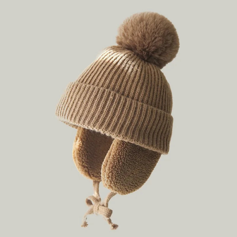 Bonnet tricoté pour enfants avec protège-oreilles et pompon, doublure douce en polaire, bonnet d'hiver chaud pour garçons et filles | Sansoti