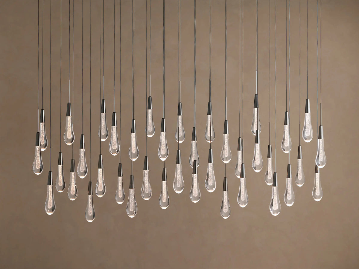 Lustre linéaire avec lampes LED réglables adapté à la salle à manger et à la cuisine en verre fabriqué à la main au design moderne | Sansoti