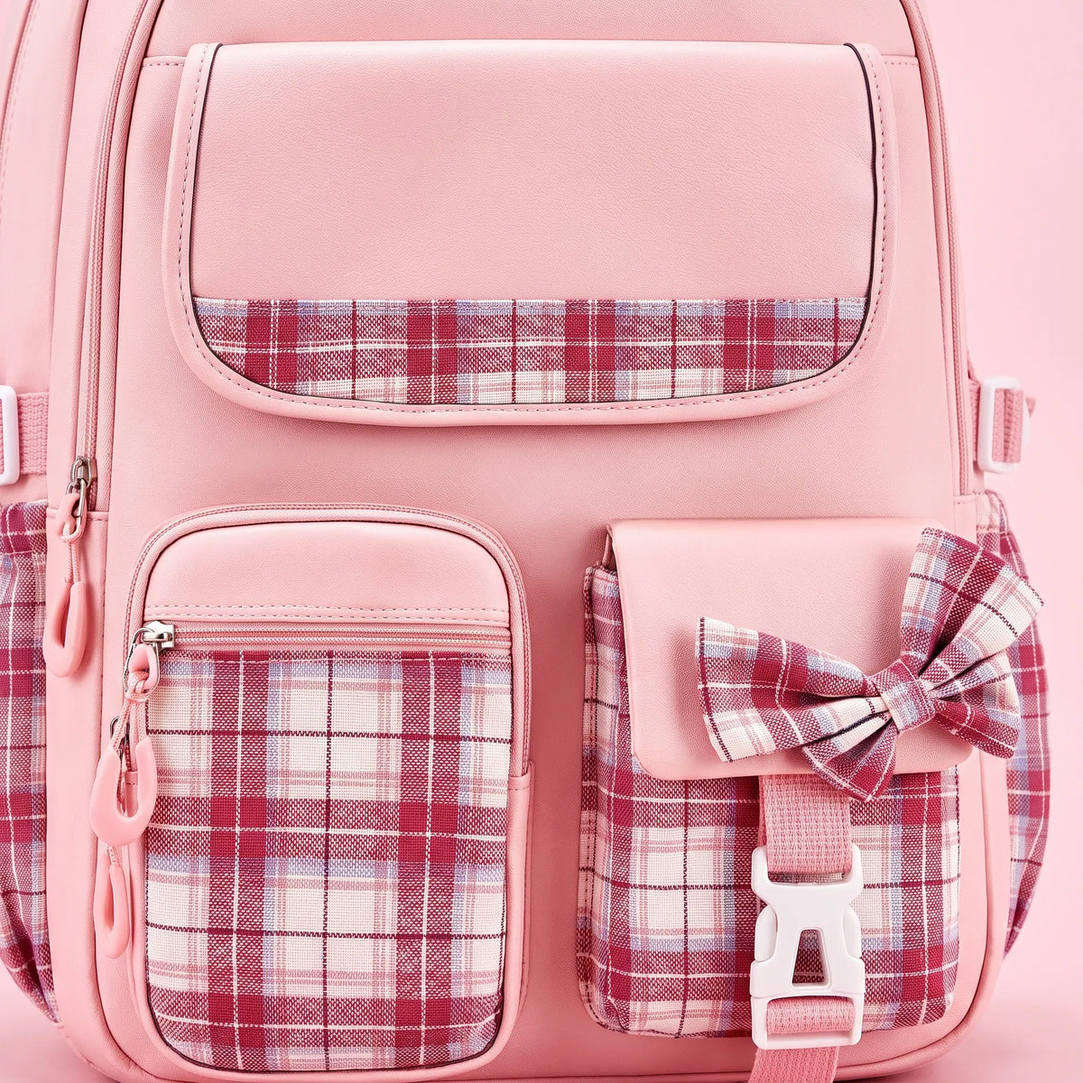 School backpack with plaid detail and ergonomic shoulder straps for elementary school students' daily use | Sansoti