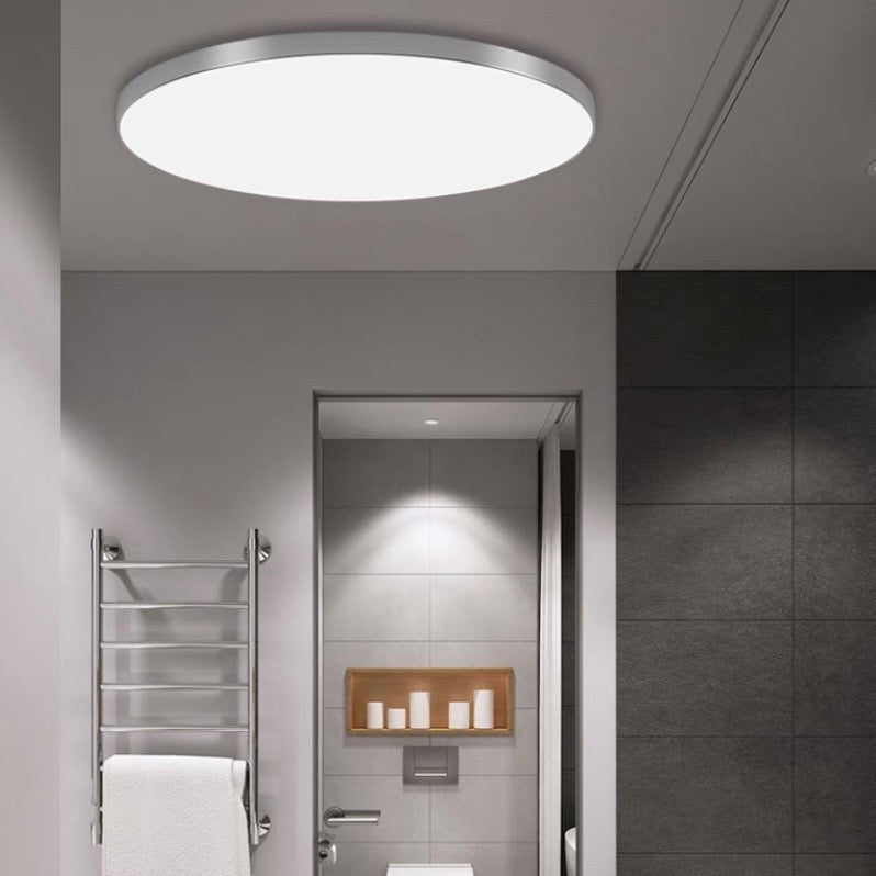 Plafonnier rond LED ultrafin à intensité variable ⌀30/37/45cm, noir, blanc, argent ou doré, au design moderne et épuré, pour salon | Sansoti