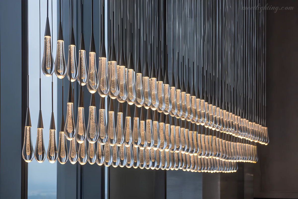 Lustre linéaire avec lampes LED réglables adapté à la salle à manger et à la cuisine en verre fabriqué à la main au design moderne | Sansoti