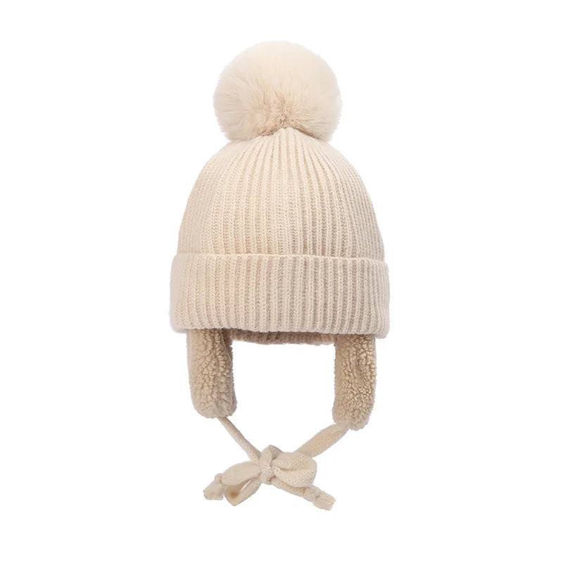 Bonnet tricoté pour enfants avec protège-oreilles et pompon, doublure douce en polaire, bonnet d'hiver chaud pour garçons et filles | Sansoti