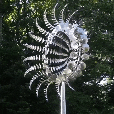 Skulpturales Windspiel aus Metall für Garten und Terrasse mit beruhigender Drehbewegung | Restfield