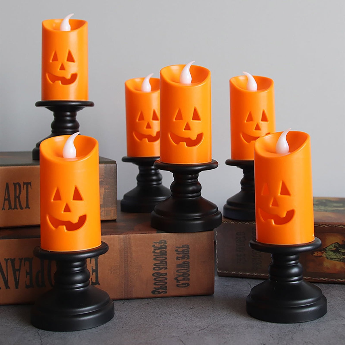 Świeca LED w kształcie dyni z upiorną twarzą do dekoracji na Halloween, bezpieczna i nastrojowa, na baterie, lampka tealight do nastrojowego oświetlenia | Sansoti