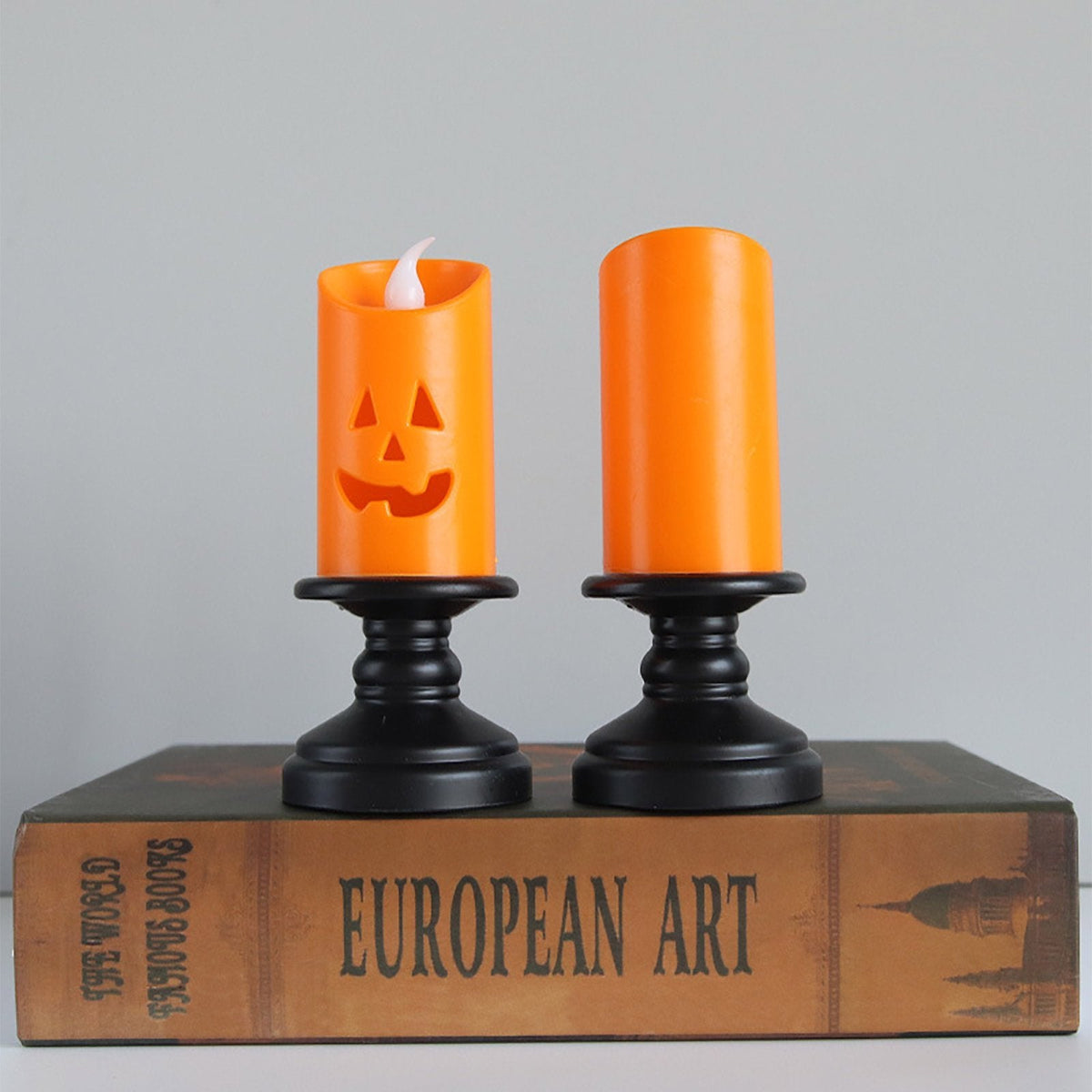 Świeca LED w kształcie dyni z upiorną twarzą do dekoracji na Halloween, bezpieczna i nastrojowa, na baterie, lampka tealight do nastrojowego oświetlenia | Sansoti