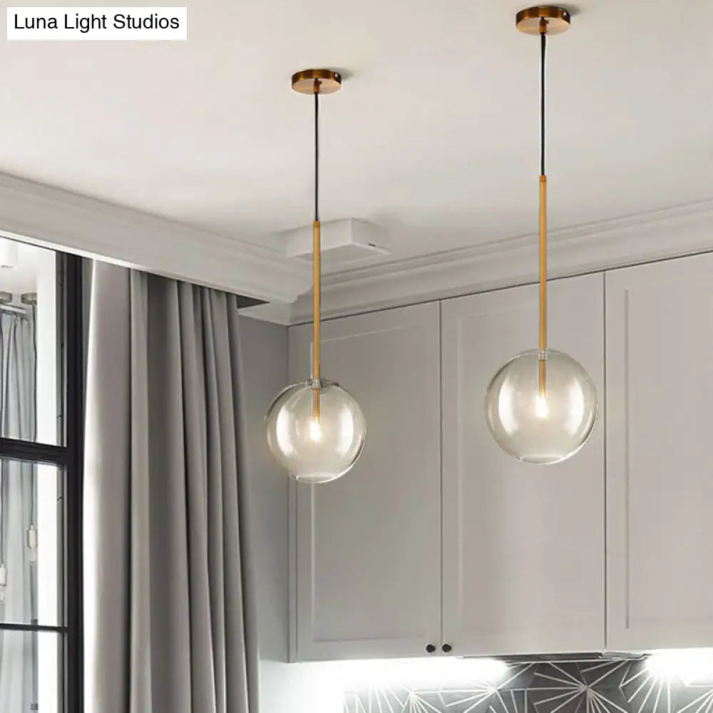Suspension boule en verre doré design minimaliste éclairage de plafond sphérique intérieur moderne salon salle à manger | Sansoti