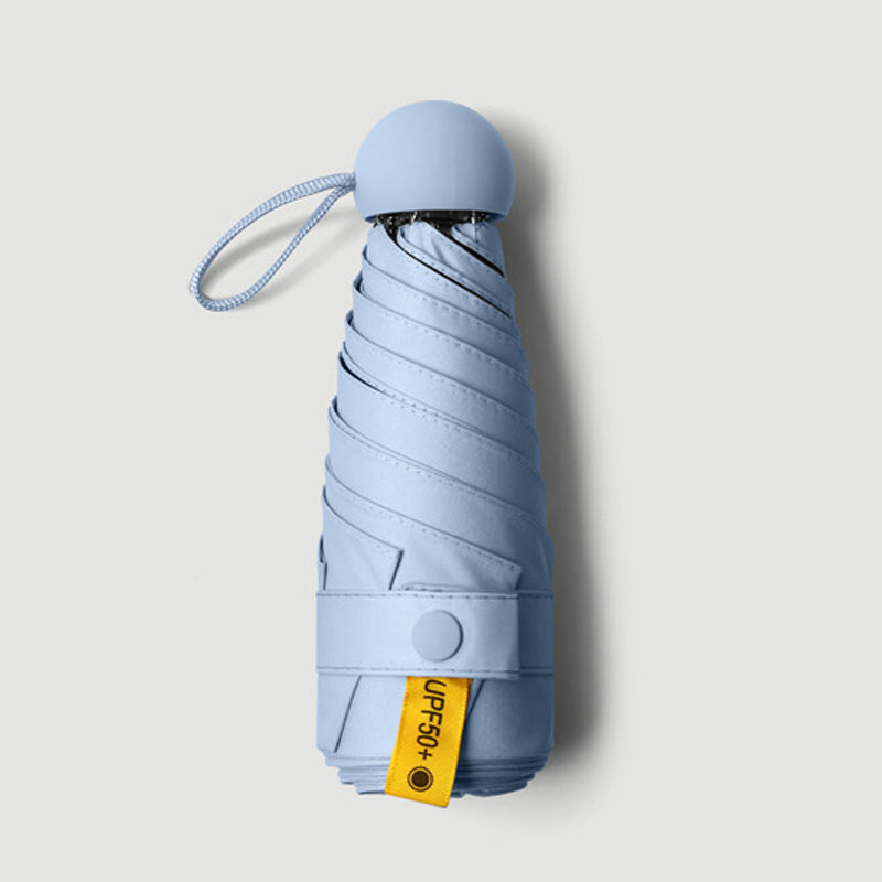 Kompakter faltbarer Regenschirm Capsule UPF50+ UV-Schutz im Taschenformat windbeständiger Mini-Reiseschirm | Sansoti