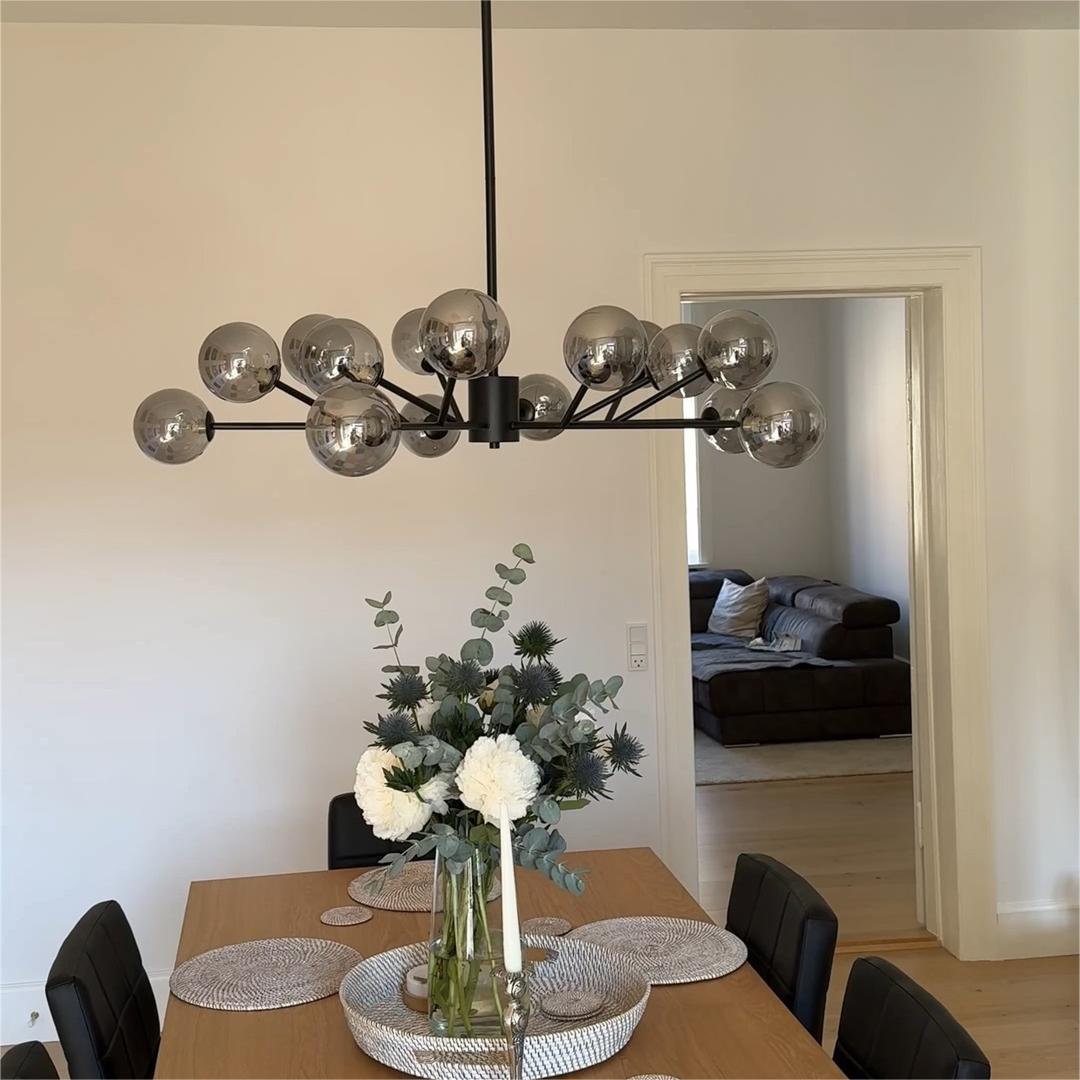 Moderne lineare Sputnik-Kronleuchter mit 15 Glaskugeln in Schwarz oder Messing – Design-Hängelampe 112 cm | Restfield
