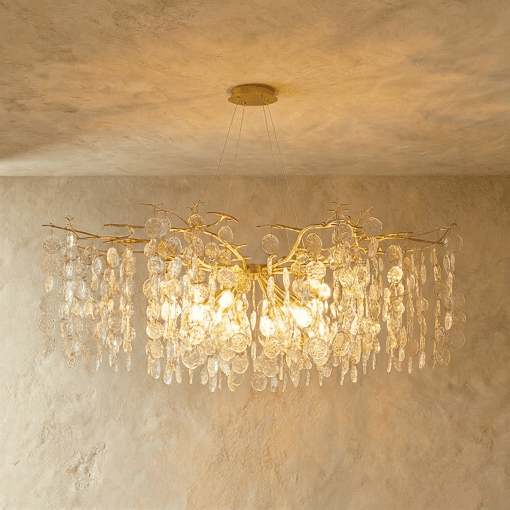 Luxe Kristallen Kroonluchter Met Gouden Takkenstructuur En Sprankelende Lichtval | Sansoti