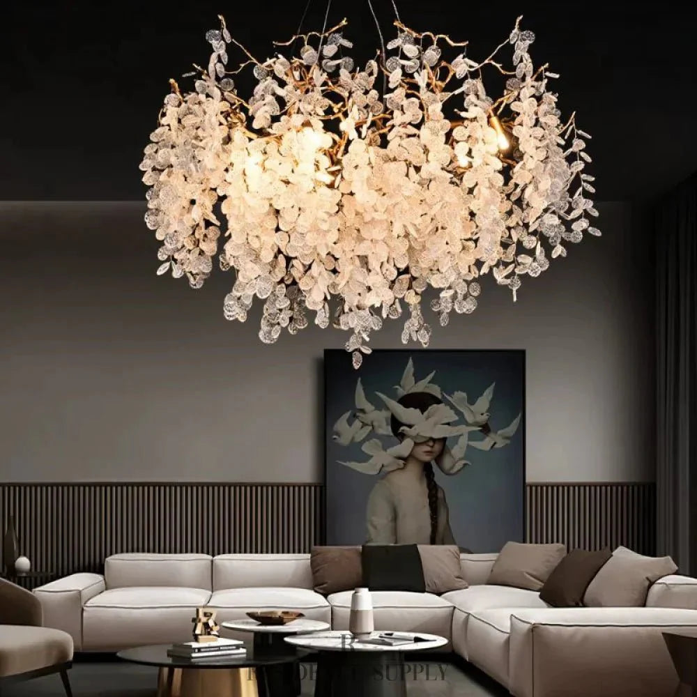 Luxe Kristallen Kroonluchter Met Gouden Takkenstructuur En Sprankelende Lichtval | Sansoti